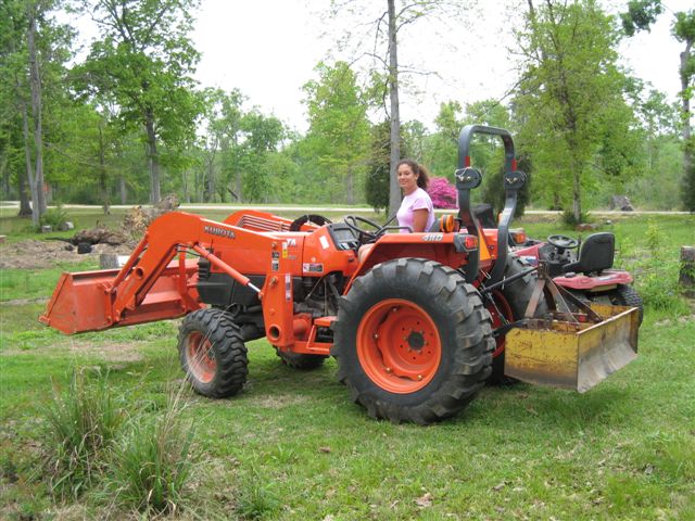 Kylie + Tractor = Get out of the way!!!